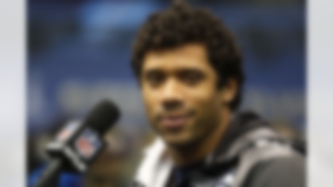Seattle Seahawks quarterback Russell Wilson (3) answers questions from the media during the Super Bowl XLVIII Media Day at the Prudential Center on Tuesday, January 28, 2014 in Newark, NJ. (Perry Knotts/NFL)