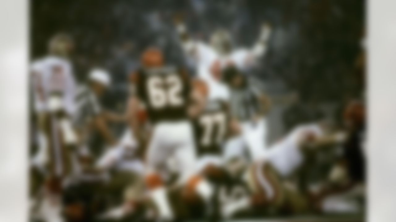 San Francisco 49ers Hall of Fame cornerback Ronnie Lott (42) celebrates the 49ers third quarter goalline stand during Super Bowl XVI, a 26-21 victory over the Cincinnati Bengals on January 24, 1982, at the Pontiac Silverdome in Pontiac, Michigan. (Al Messerschmidt/NFL Photos)