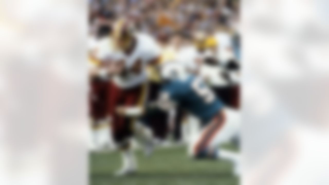 Running back John Riggins of the Washington Redskins rushes upfield during the Redskins 27 - 17 victory over the Miami Dolphins in Super Bowl XVII on January 30, 1983 at the Rose Bowl in Pasadena, CA. (AP Photo/Al Messerschmidt)
