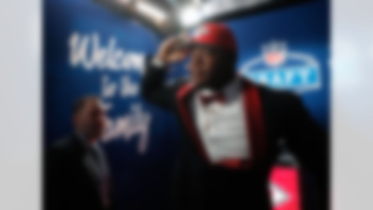 Mississippi State defensive tackle Chris Jones salutes as he walks onto the stage during the 2016 NFL Draft at the Auditorium Theatre on Thursday, April 28, 2016 in Chicago. (Ben Liebenberg/NFL)