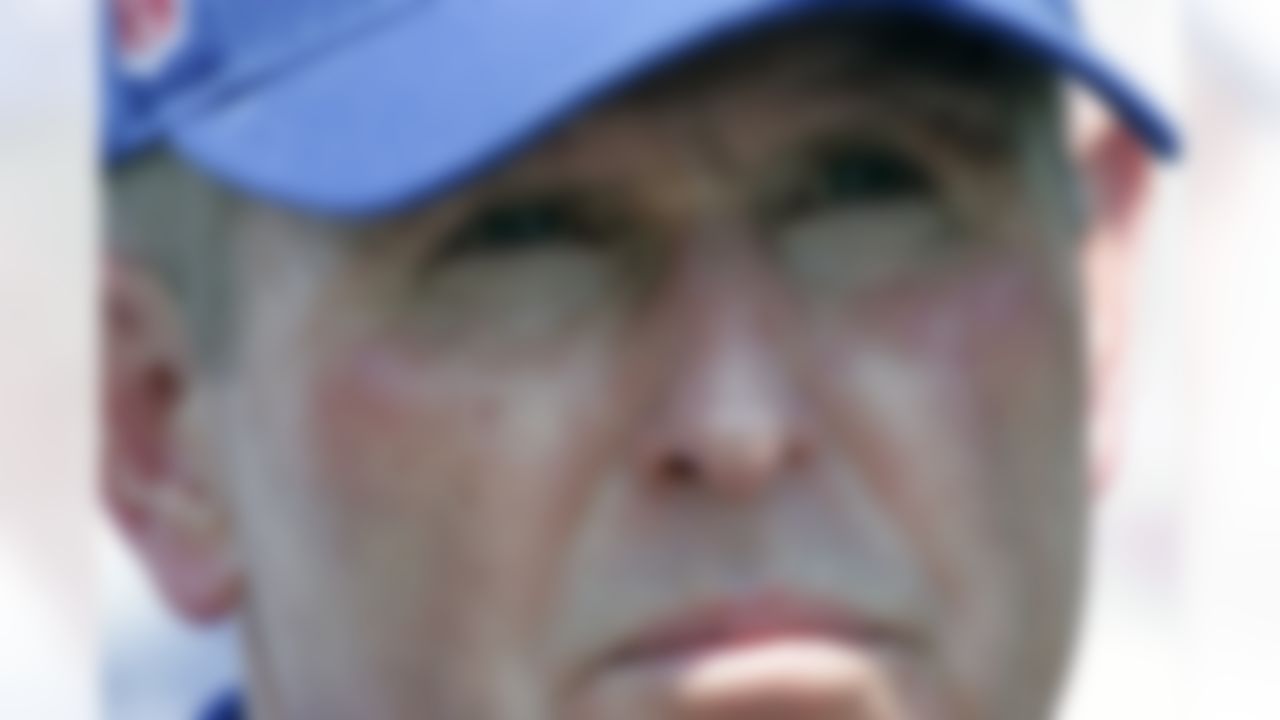 New York Giants head coach Tom Coughlin listens to a reporter's question after Giants NFL training camp on July 31st, 2007in Albany, N.Y. (AP Photo/Mike Groll)