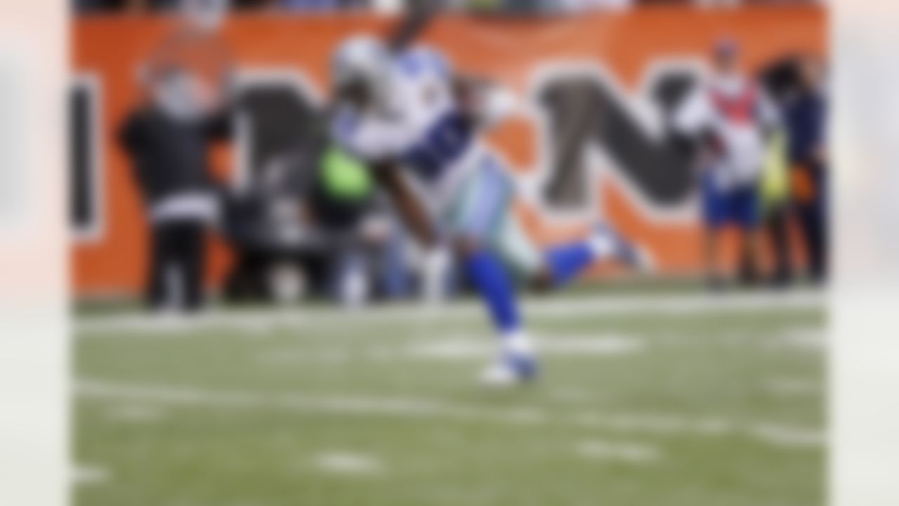 Dallas Cowboys receiver Dez Bryant (88) runs after a catch for a 27 yard touchdown during an NFL football game against the Cincinnati Bengals on Sunday, December 9, 2012, at Paul Brown Stadium in Cincinnati, Ohio. The Cowboys defeated the Bengals, 20-19. (AP Photo/James D Smith)