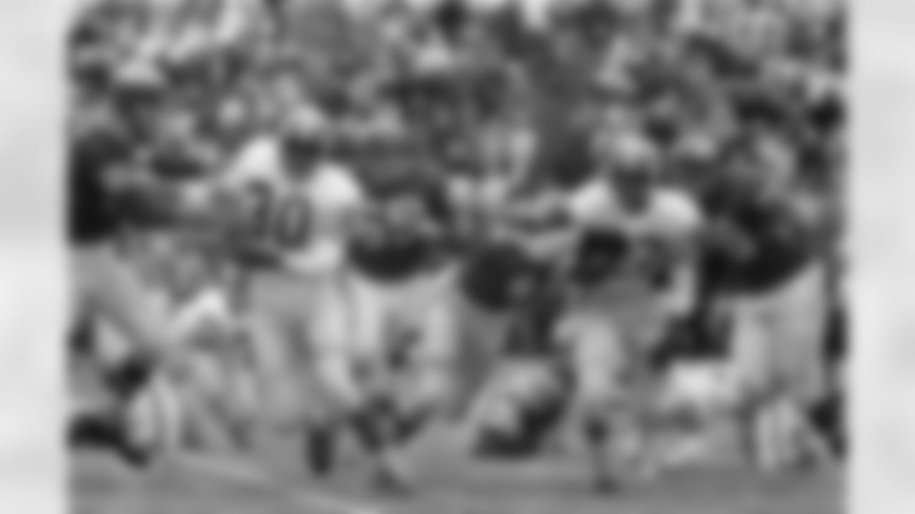 Denver Broncos' Charley Mitchell (27) in action against the Kansas City Chiefs at Municipal Stadium in Kansas City, Mo. Dec. 8, 1963. (Rich Clarkson/AP Images)