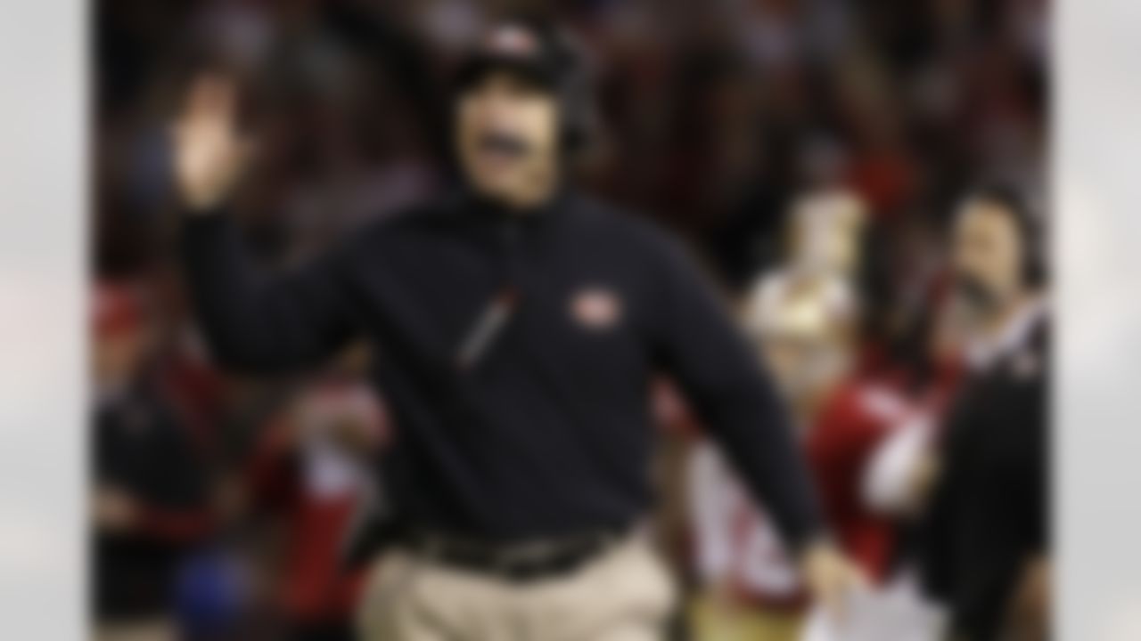 San Francisco 49ers head coach Jim Harbaugh gestures during the second half of an NFL football game against the Chicago Bears in San Francisco, Monday, Nov. 19, 2012. (AP Photo/Tony Avelar)