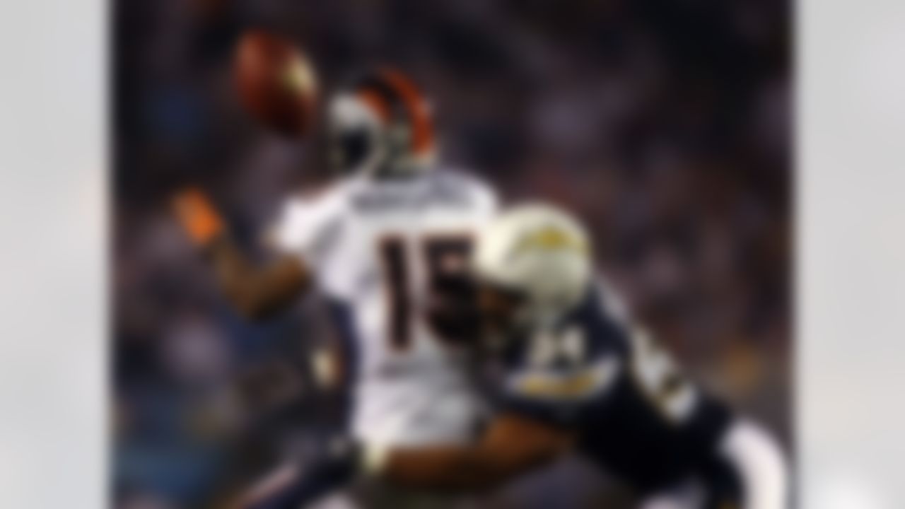SAN DIEGO - DECEMBER 24: Wide receiver Brandon Marshall #15 of the Denver Broncos pulls in a reception against Stephen Cooper #54 of the San Diego Chargers during the second half of their NFL game at Qualcomm Stadium December 24, 2007 in San Diego, California. (Photo by Donald Miralle/Getty Images)