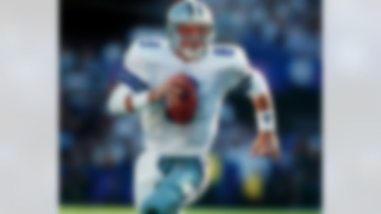 American Hall of Fame quarterback Troy Aikman #8 of the Dallas Cowboys. The overall draft pick in 1989, Aikman played 12 consecutive seasons as quarterback with the Cowboys. (AP Photo/Marc Serota)