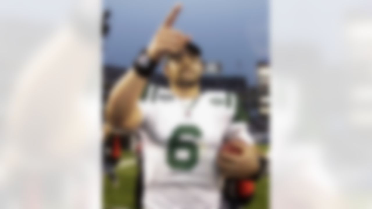 New York Jets quarterback Mark Sanchez walks off the field following the Jets' 17-14 win over the San Diego Chargers in an NFL divisional playoff football game Sunday, Jan. 17, 2010 in San Diego. The Jets won 17-14. (AP Photo/Chris Park)
