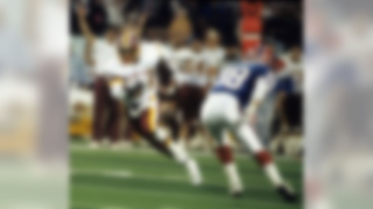 Washington Redskins wide receiver Gary Clark catches a pass during Super Bowl XXVI, a 37 - 24 victory over the Buffalo Bills on January 26, 1992, at the Hubert H. Humphrey Metrodome in Minneapolis, Minnesota. (AP Photo/Al Messerschmidt)