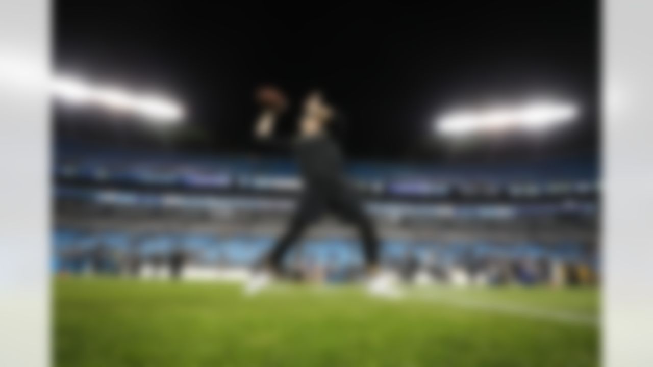 ]New Orleans Saints quarterback Drew Brees (9) warms up prior to an NFL football game against the Carolina Panthers on Monday, Dec. 17, 2018, in Charlotte, N.C.