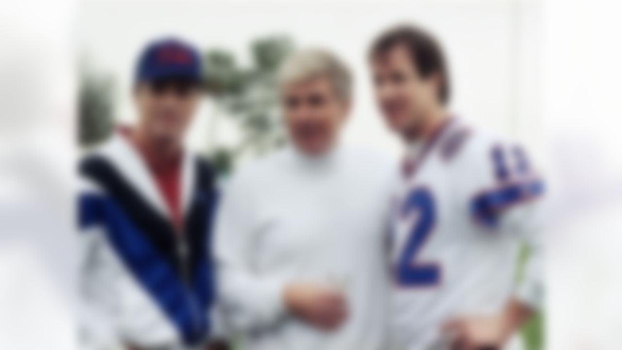 Buffalo Bills quarterbacks for the last three decades, from left; Joe Fergusen of the 1970's, Secretary of Housing and Urban Development Jack Kemp of the 1960's and Jim Kelly from the 1980's gather at Tampa Stadium, Saturday, Jan. 26, 1991 as the Buffalo Bills practice for Sunday's Super Bowl XXV against the New York Giants. (AP Photo/Mark Duncan)