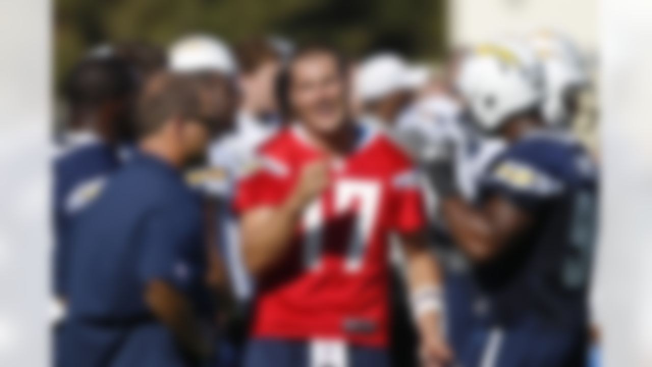 San Diego Chargers quarterback Philip Rivers gestures during a break from drills, at the NFL football team's training camp Thursday, July 26, 2012, in San Diego. (AP Photo/Lenny Ignelzi)