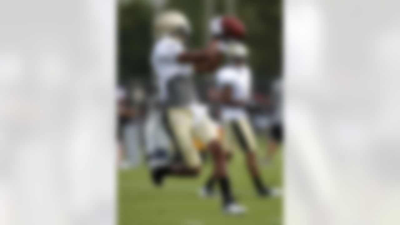 New Orleans Saints' Marques Clark catches a pass during NFL football training camp in Metairie, La., Saturday, July 28, 2012. (AP Photo/Gerald Herbert)18