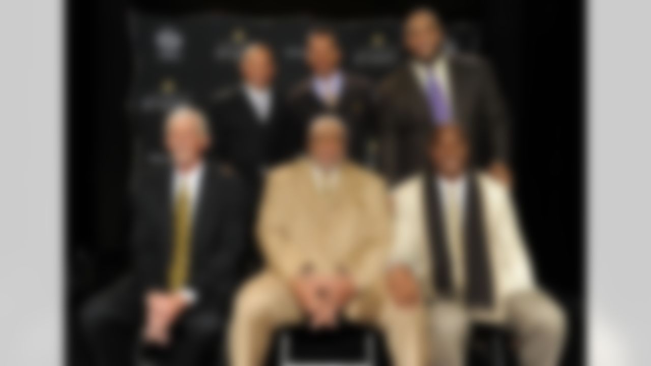 Clockwise from top left, defensive back Aeneas Williams, wide receiver Andre Reed, offensive tackle Walter Jones, linebacker Derrick Brooks , defensive lineman Claude Humphrey and punter Ray Guy pose for a photo at the NFL Honors show Saturday, Feb. 1, 2014 at Radio City Music Hall in New York. (Frank Micelotta/AP Images)