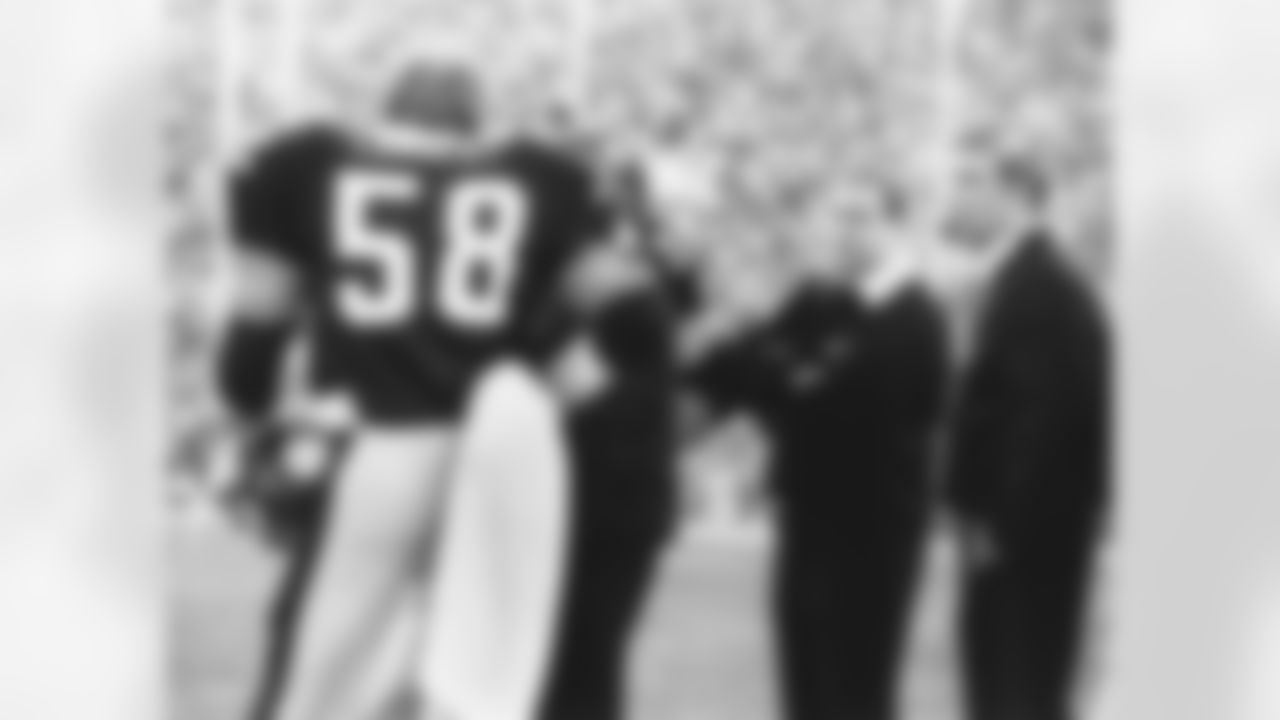Pittsburgh Steelers linebacker Jack Lambert talks with head coach Chuck Noll, and linebacker Loren Toews in a 31-19 win over the Los Angeles Rams in Super Bowl XIV on January 20, 1980 at Rose Bowl. Super Bowl XIV - Los Angeles Rams vs Pittsburgh Steelers - January 20, 1980 (National Football League)
