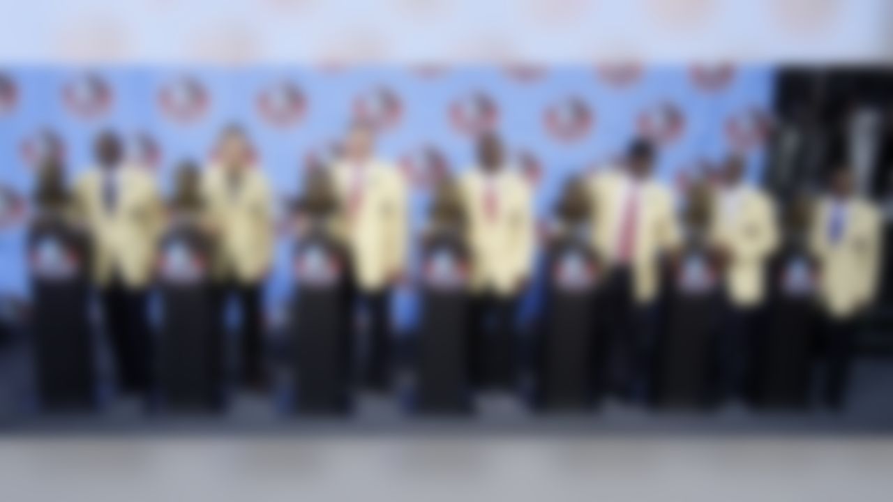 The 2010 Pro Football Hall of Fame class. From left: Emmitt Smith, Dick LeBeau, Russ Grimm, John Randle, Rickey Jackson, Jerry Rice and Floyd Little after enshrinement ceremonies at the Pro Football Hall of Fame in Canton, Ohio Saturday, Aug. 7, 2010. (AP Photo/Mark Duncan)