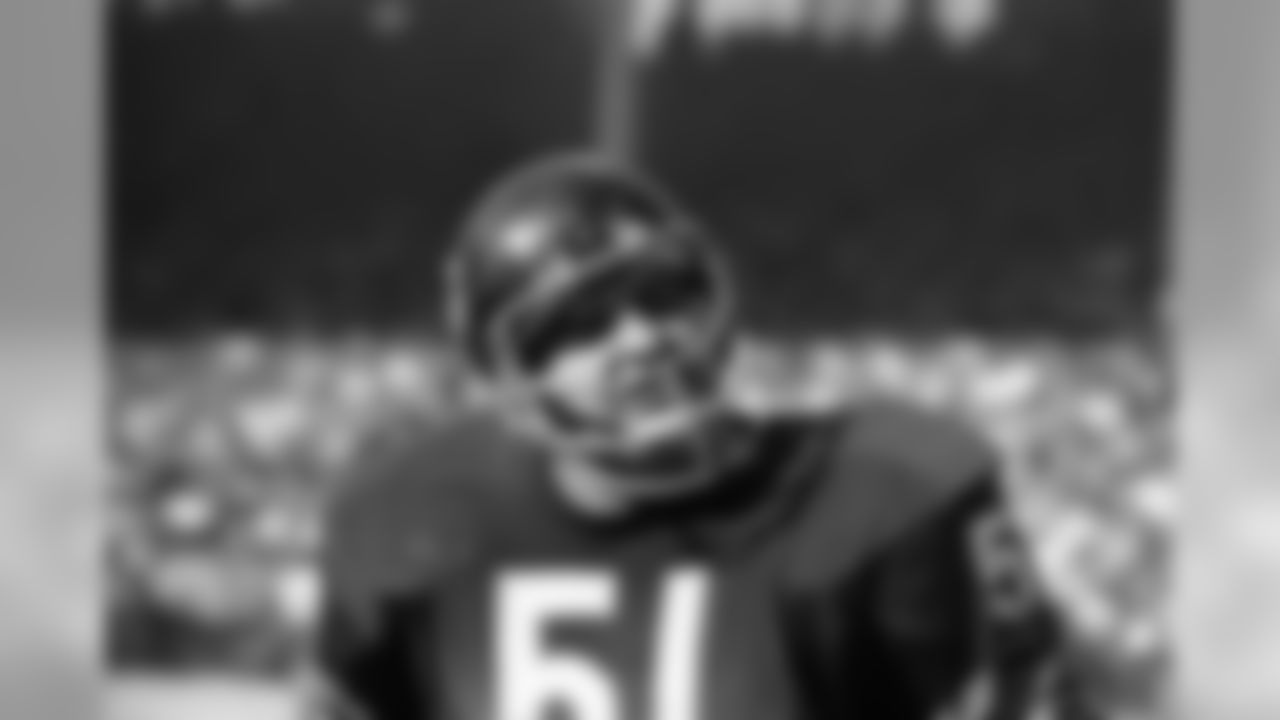 Chcago Bears' linebacker Dick Butkus doesn't agree with an official's call in the the third period of game with Cleveland Browns, October 22, 1967. Cleveland's Gary Collins caught a sideline pass and Butkus argued the Browns' flanker was out of bounds. The play covered 24 yards and and was good for a first down. (Associated Press)