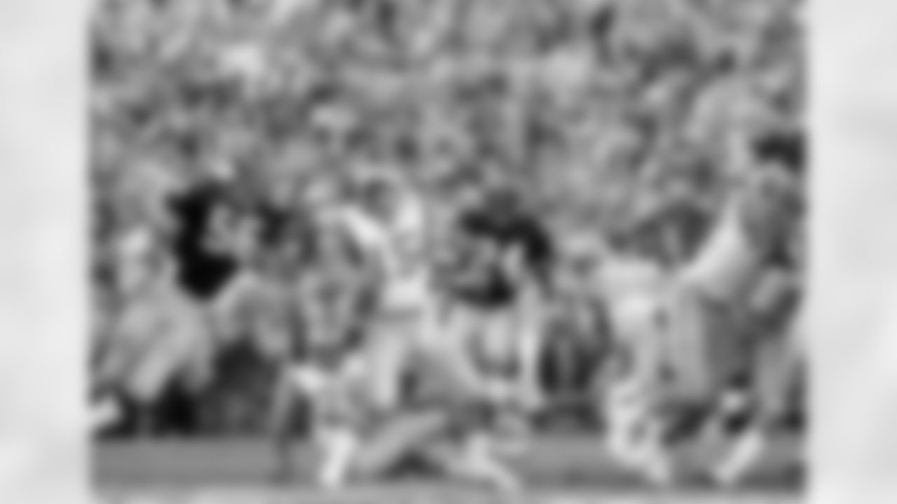 Rams quarterback Vince Ferragamo (15) prepares to pass but never gets the ball past Steelers' Robin Cole (56), during Super Bowl XIV action at the Rose Bowl in Pasadena, Calif., Jan. 21, 1980. Ferragamo is sacked on the play. The Rams Lost to the Steelers, 31-19. (AP Photo/John Filo)