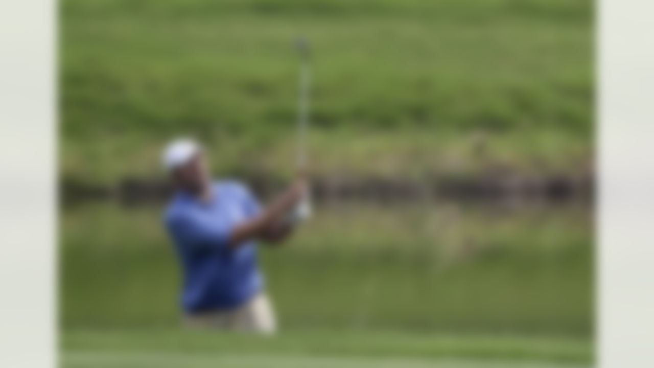 Dallas Cowboys quarterback Tony Romo plays his second shot on the par-5 fourth hole during sectional qualifying for the 2010 U.S. Open golf tournament Monday, June 7, 2010 at the Club at Carlton Woods in The Woodlands, Texas. Romo made a triple bogey 8 on the hole. The U.S. Open will be played June 14-20 at Pebble Beach Golf Links in Pebble Beach, Calif. (AP Photo/David J. Phillip)