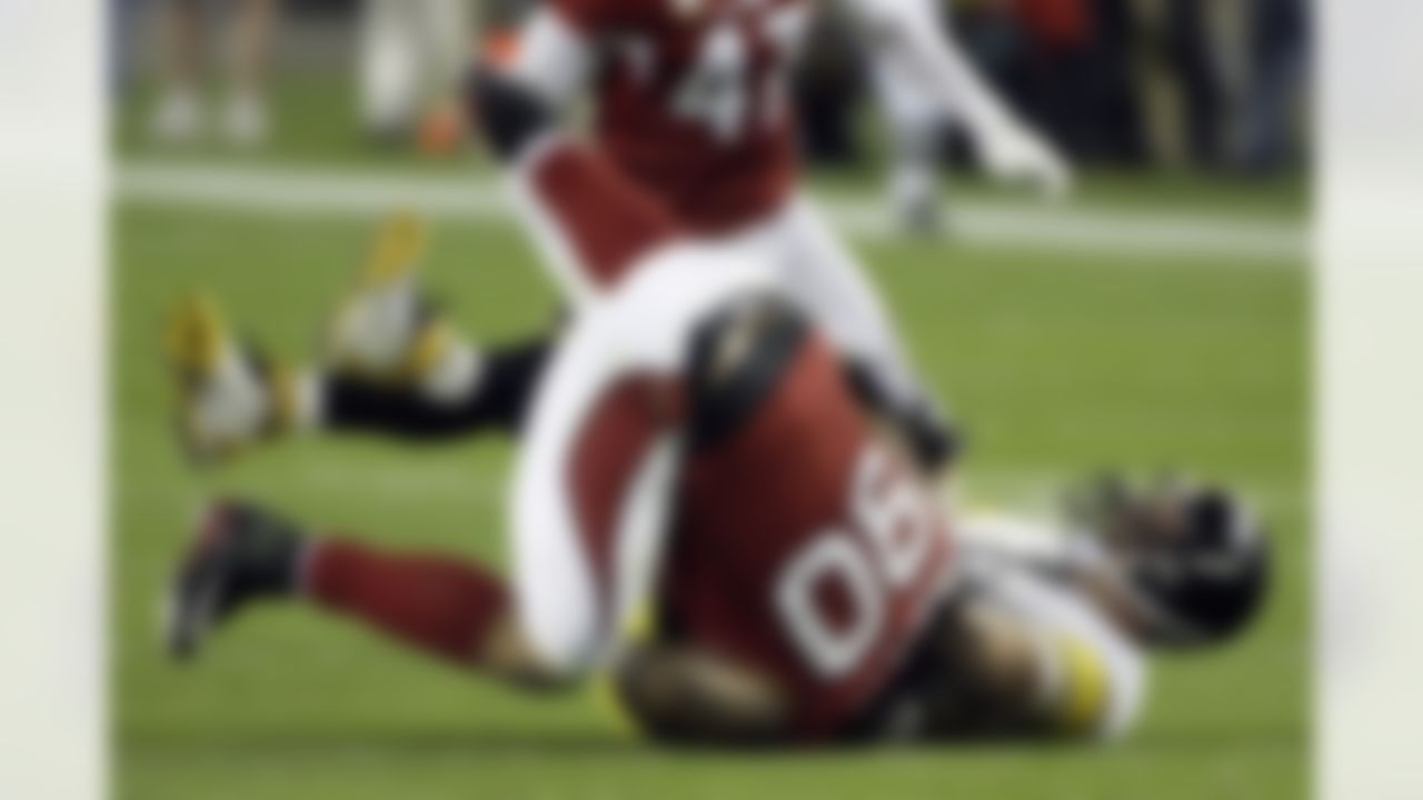 Arizona Cardinals defensive tackle Darnell Dockett (90) sacks Pittsburgh Steelers quarterback Ben Roethlisberger during the fourth quarter of the NFL Super Bowl XLIII football game, Sunday, Feb. 1, 2009, in Tampa, Fla. (AP Photo/John Bazemore)