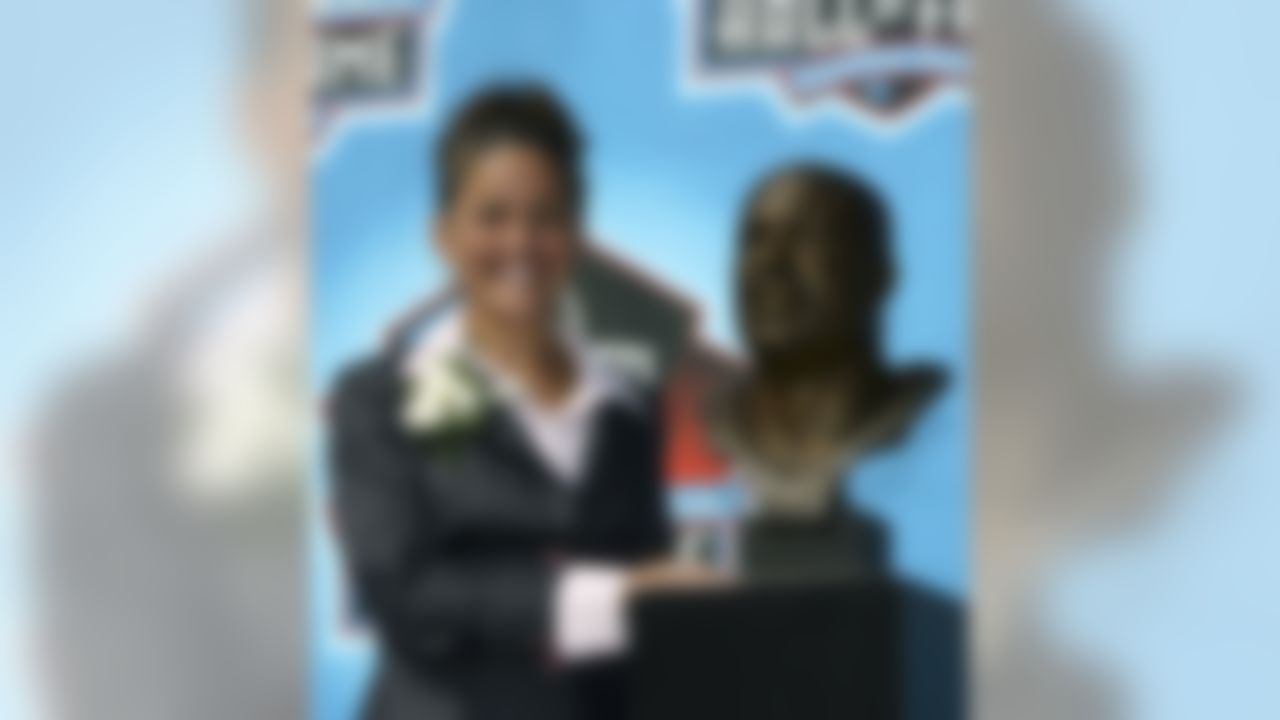 CANTON, OH - AUGUST 05: Sara White, wife of the late Reggie White, poses with his bust after his induction during the Class of 2006 Pro Football Hall of Fame Enshrinement Ceremony at Fawcett Stadium on August 5, 2006 in Canton, Ohio. (Photo by Doug Benc/Getty Images)
