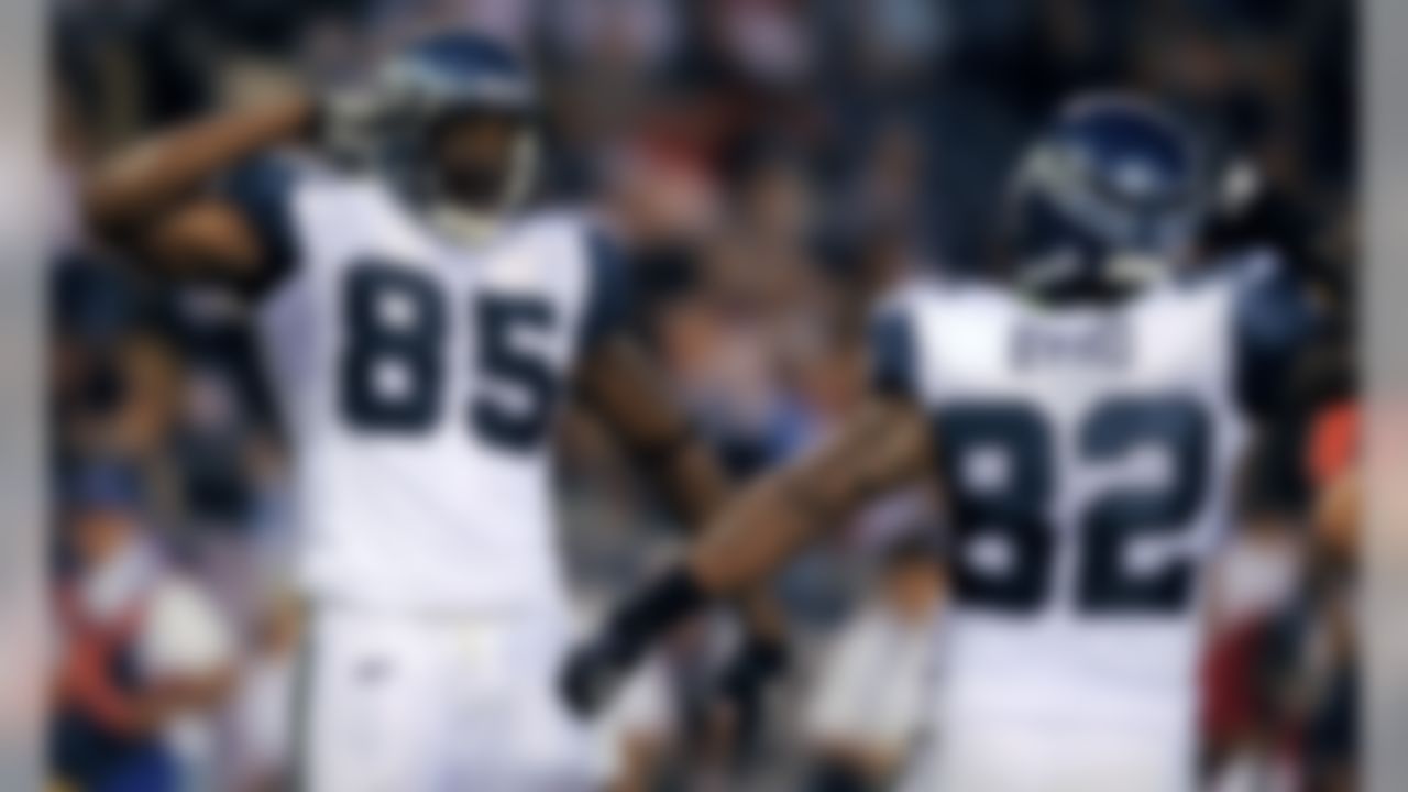 Seattle Seahawks tight end Anthony McCoy, left, and tight end Dominique Byrd celebrate after McCoy scored a touchdown against the San Diego Chargers during the second half of a preseason NFL football game Stadium on Thursday, Aug. 11, 2011, in San Diego. Seattle won 24-17. (AP Photo/Mark J. Terrill)