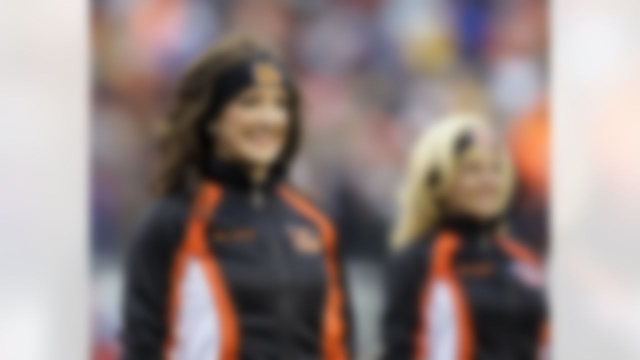 Cincinnati Bengals cheerleaders preform during the first half of an NFL wild-card playoff football game against the New York Jets, Saturday, Jan. 9, 2010, in Cincinnati. (AP Photo/Rob Carr)