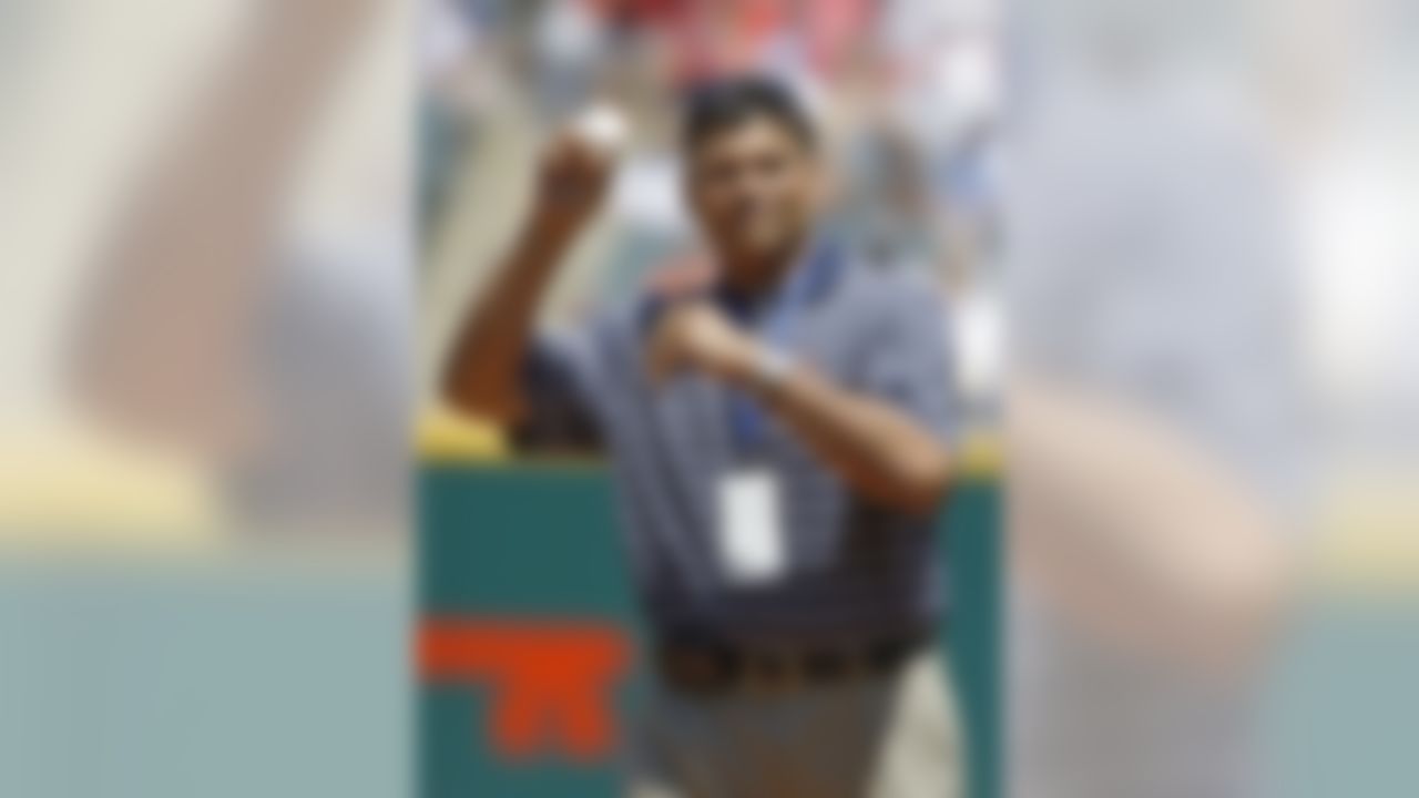 Cincinnati Bengals Hall of Fame lineman Anthony Munoz throws out the ceremonial pitch before a baseball game between the Cincinnati Reds and Cleveland Indians, Sunday, May 23, 2010, in Cleveland. (AP Photo/Mark Duncan)