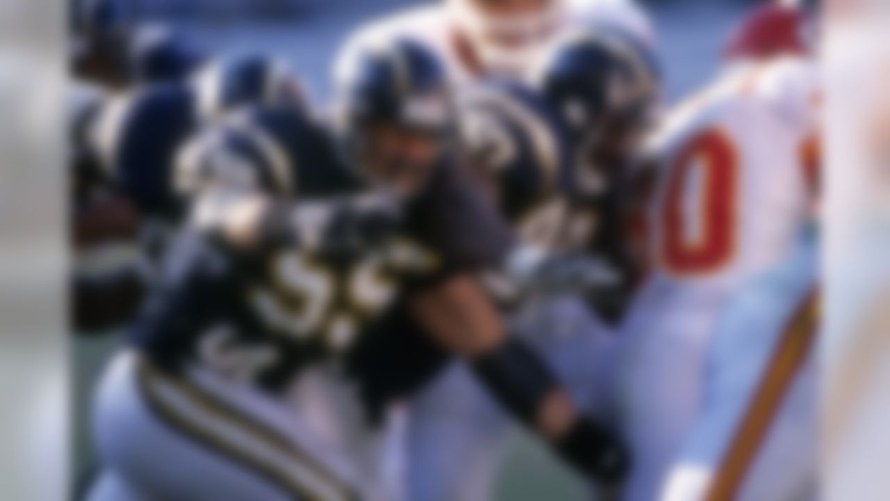 San Diego Chargers linebacker Junior Seau (55) pursues a runner during an NFL game against the Kansas City Chiefs, Sunday, Nov. 22, 1998 in San Diego. The Chargers won the game, 38 to 37. (AP Photo/Greg Trott)