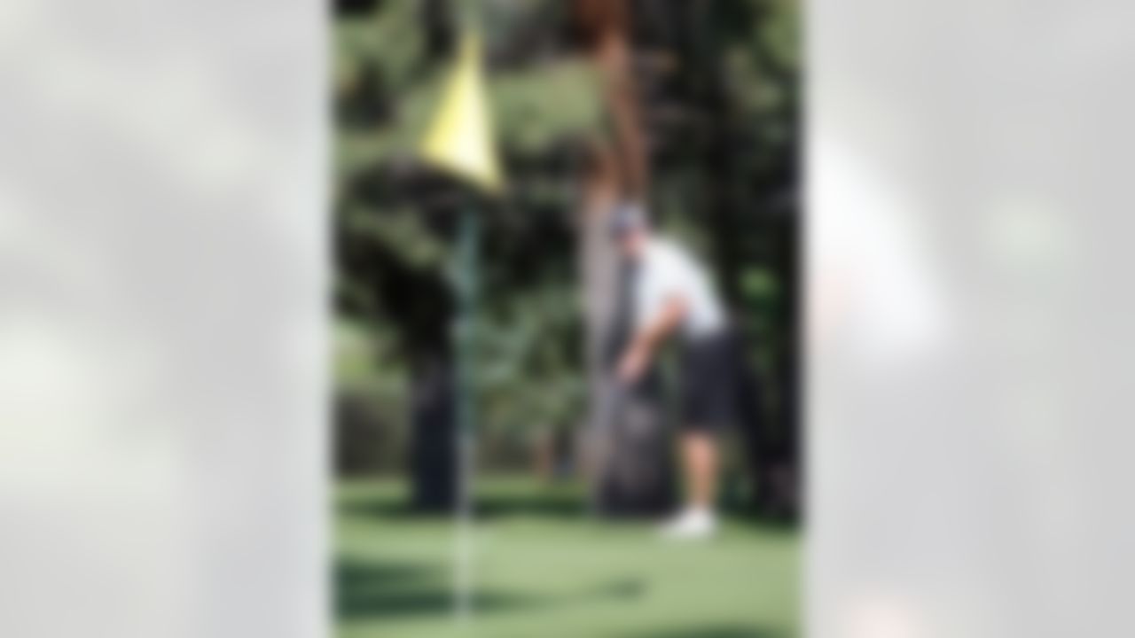 Aaron Rodgers of the Green Bay Packers putts during the American Century Championship at Edgewood Tahoe Golf Course in Stateline, Nevada on July 9, 2008. (Ben Liebenberg/NFL)