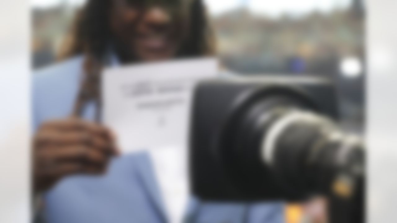 Shaquem Griffin holds his draft card.