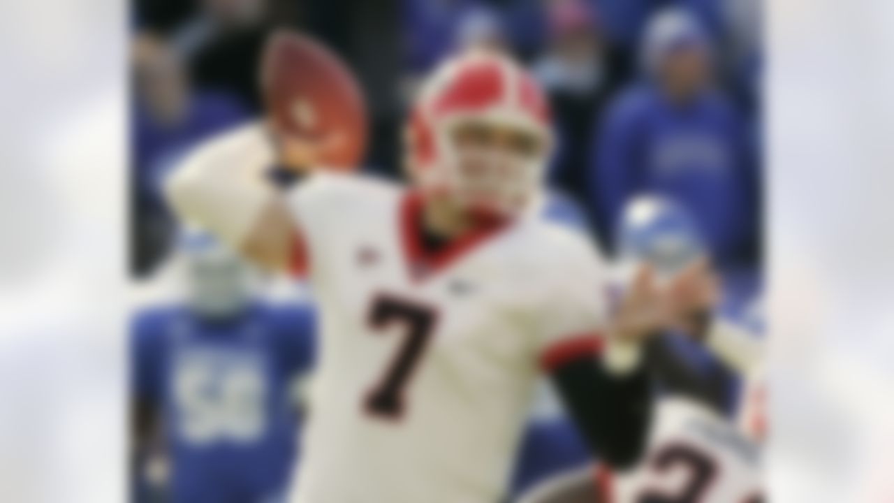 Georgia quarterback Matthew Stafford throws a pass during the second half of an NCAA college football game against Kentucky in Lexington, Ky., Saturday, Nov. 8, 2008. Stafford threw for 376 yards and three touchdowns in their 42-38 win. (AP Photo/Ed Reinke)
