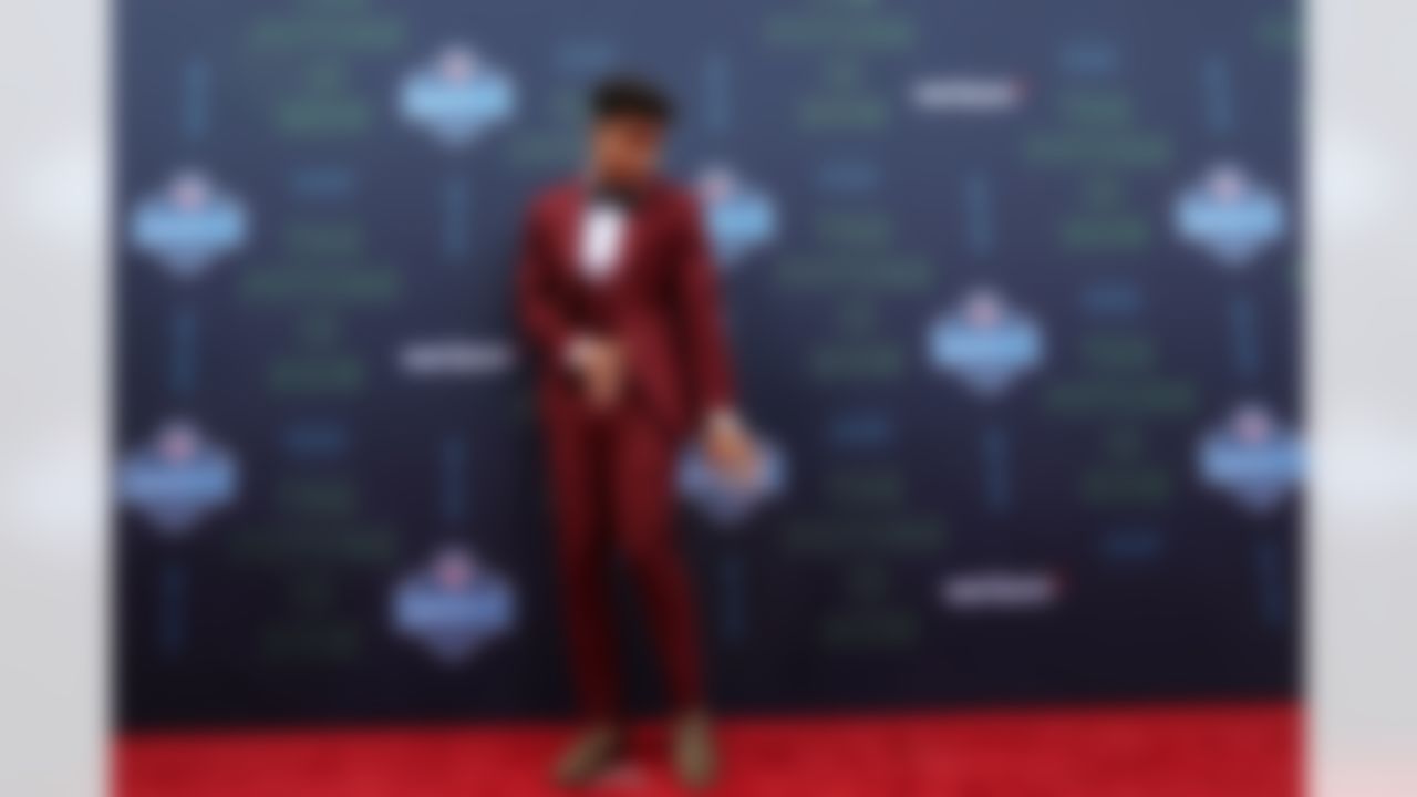 Louisville cornerback Jaire Alexander poses for a photo on the red carpet.