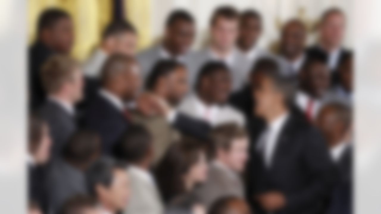 President Barack Obama greets members of New Orleans Saints football team during a ceremony honoring the 2009 NFL Super Bowl NFL Football Champions, Monday, Aug. 9, 2010, in the East Room of the White House in Washington. (AP Photo/Pablo Martinez Monsivais)