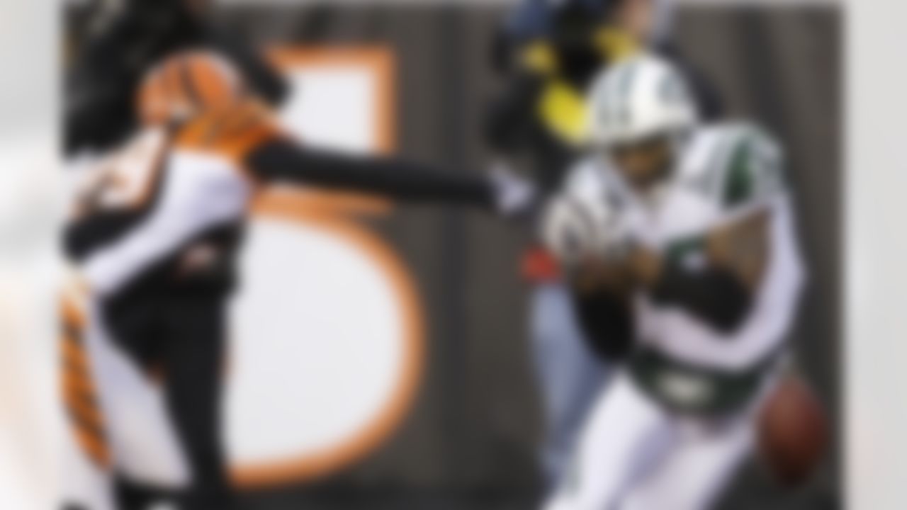 Cincinnati Bengals cornerback Leon Hall breaks up a pass in the end zone intended for New York Jets wide receiver Braylon Edwards (17) during the first half of an NFL wild-card playoff football game, Saturday, Jan. 9, 2010, in Cincinnati (AP Photo/Rob Carr)