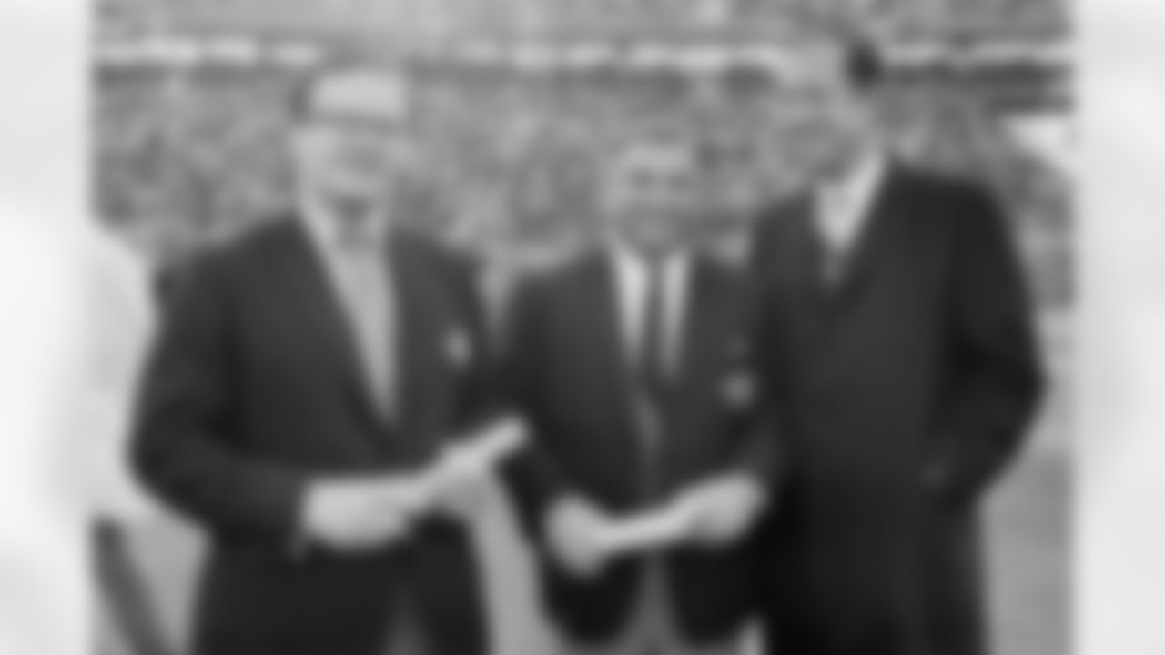Lamar Hunt, left, one of the founders of the AFL, poses with Kansas City Chief's coach Hank Stram, center, and Pro Football Commissioner Pete Rozelle prior to the Super Bowl in New Orleans on Jan. 11, 1970. The AFL and NFL will merge later this year and become one league. (Associated Press)