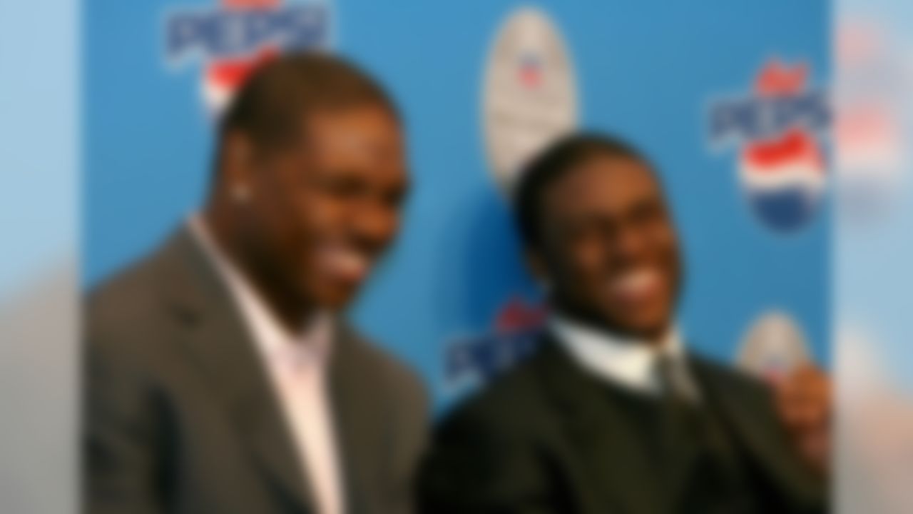 Feb 1, 2007; Miami Beach, FL, USA; New Orleans Saints running back Reggie Bush (right) and Jacksonville Jaguars running back Maurice Jones-Drew react to reporters questions during the Diet Pepsi NFL Rookie of the Year award press conference at the Miami Beach Convention Center in Miami Beach, Florida. Mandatory Credit: Jimmy DeFlippo-US PRESSWIRE