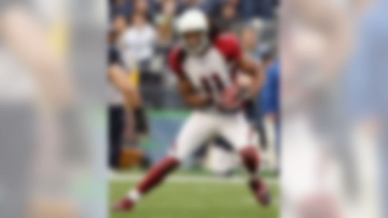 Larry Fitzgerald, like many fantasy footballers, benefited from the Cardinals decision to go with Kurt Warner. (Photo by Otto Greule Jr/Getty Images)