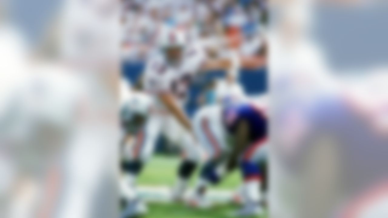 12 Nov 1995: Dan Marino #13 of the Miami Dolphins calls the count during a game against the New England Patriots at the Joe Robbie Stadium in Miami, Florida. The Patriots defeated the Dolphins 34-17. (Scott Halleran/Allsport)