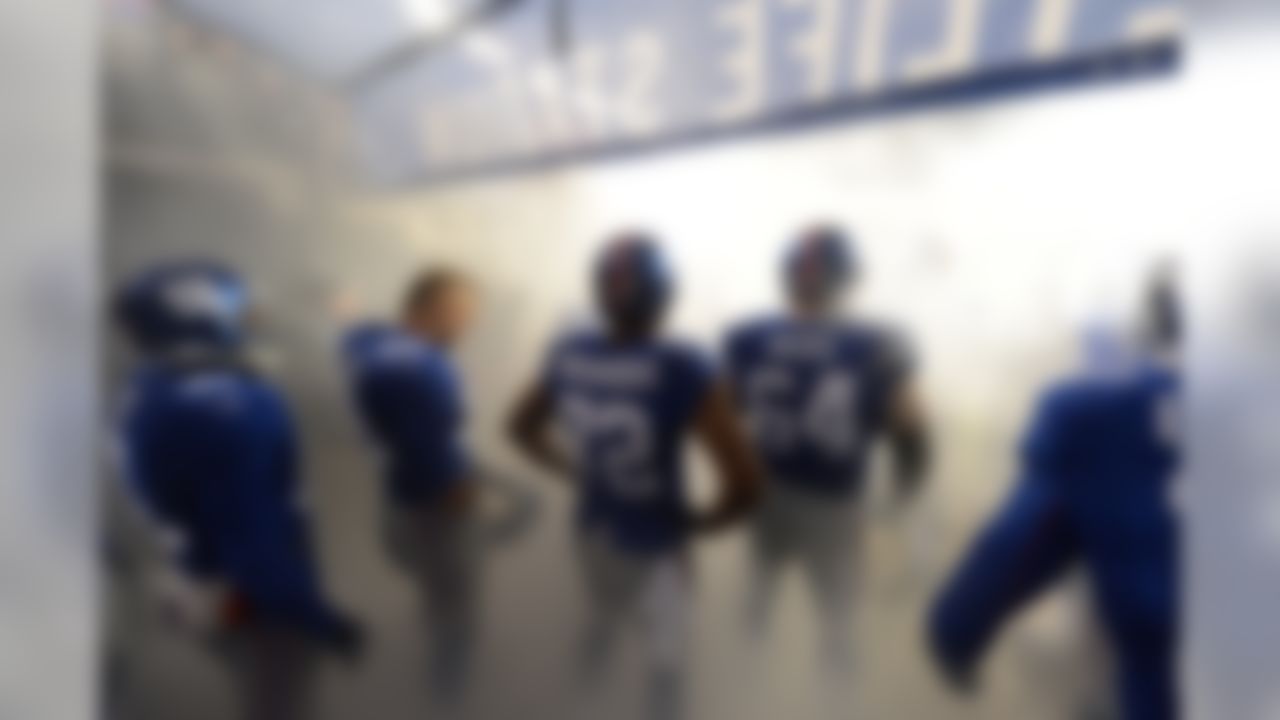 The New York Giants wait to be introduced during pre game before a week 12 football game against the Green Bay Packers on November 25, 2012 in East Rutherford, New Jersey (AP Photo/Evan Pinkus)