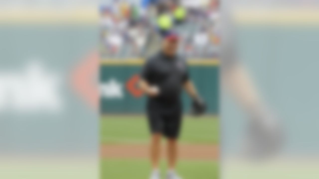 Pro Football Hall of Famer Joe DeLamielleure prepares to throw out a ceremonial pitch before a baseball game between the Pittsburgh Pirates and Cleveland Indians Sunday, June 19, 2011, in Cleveland. (AP Photo/Mark Duncan)