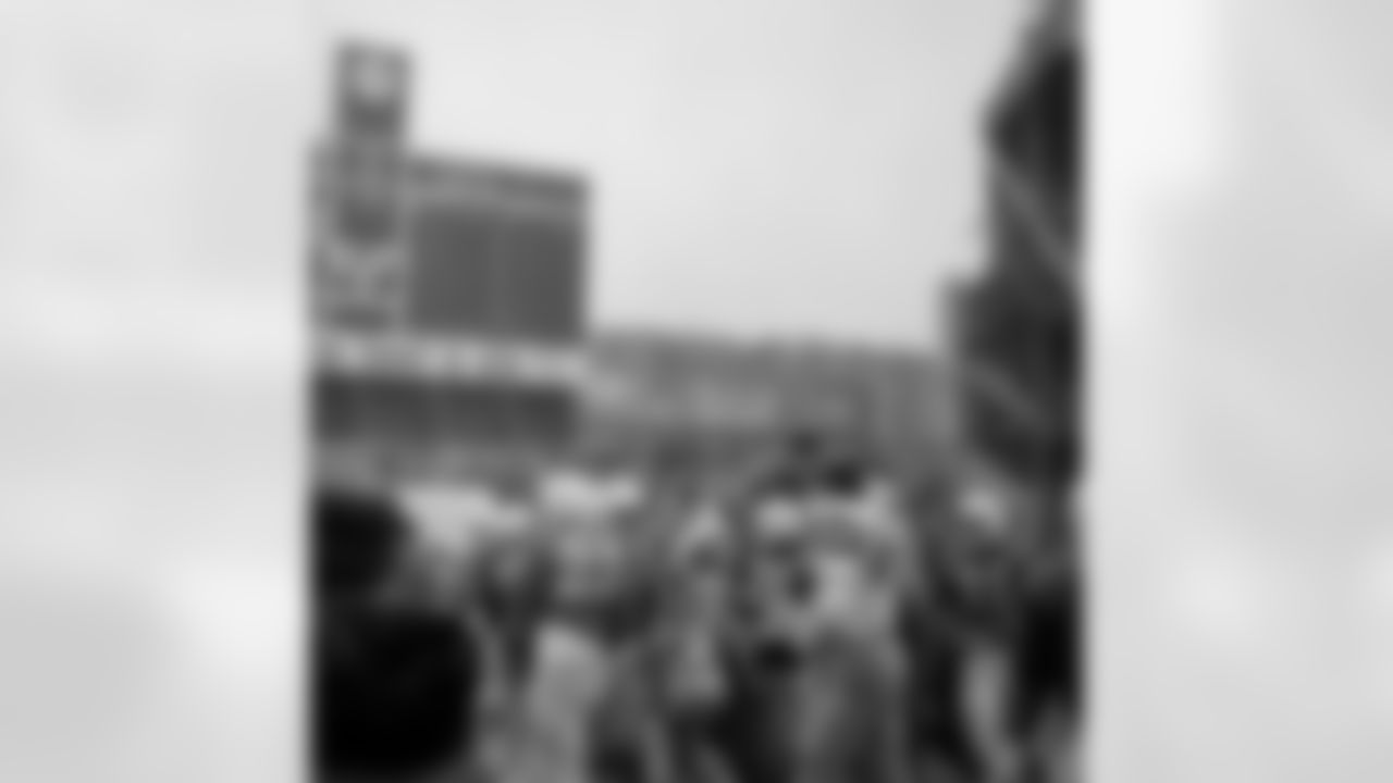 Players hoist Nebraska coach Bob Devaney to their shoulders to field at Yankee Stadium in New York City on Dec. 15, 1962 after the Cornhuskers defeated Miami in the Gotham Bowl game, 36-34. Identifiable Cornhuskers, in dark jerseys, are: Dave Theisen (23), Willie Pasehall (33), and Rudy Johnson (31). Miami players, in which, are: Dan Conners (74) and James Simon (84). (Associated Press)