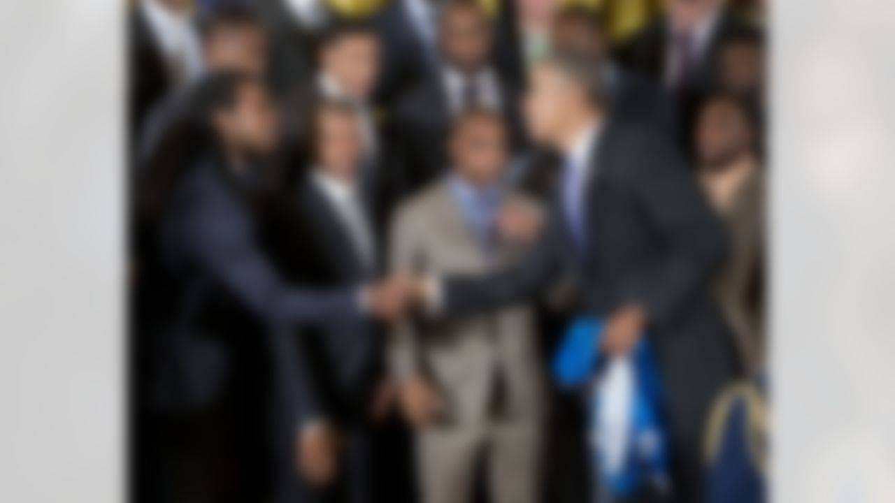 President Barack Obama shakes hands with Seattle Seahawks cornerback Richard Sherman, accompanied by quarterback Russell Wilson, and wide receiver Doug Baldwin and others, during a ceremony the East Room of the White House in Washington, Wednesday, May 21, 2014, where the president honored the NFL Super Bowl champion Seattle Seahawks. The Seahawks defeated the Denver Broncos in Super Bowl XLVIII. (Pablo Martinez Monsivais/Associated Press)