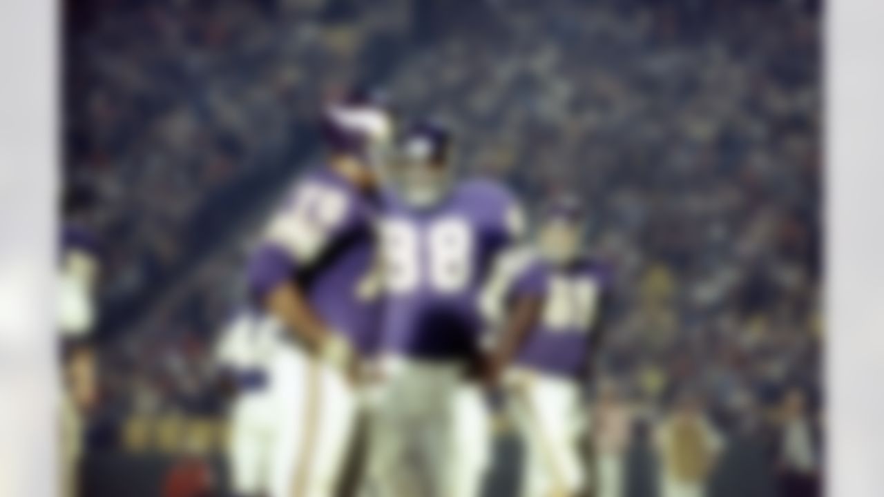 Minnesota Vikings defensive end Jim Marshall (70) and defensive tackle Alan Page (88) wait for the offense during their game with the Los Angeles Rams in Los Angeles, Calif., Sept. 22, 1967. Rams won, 39-3. (National Football League)