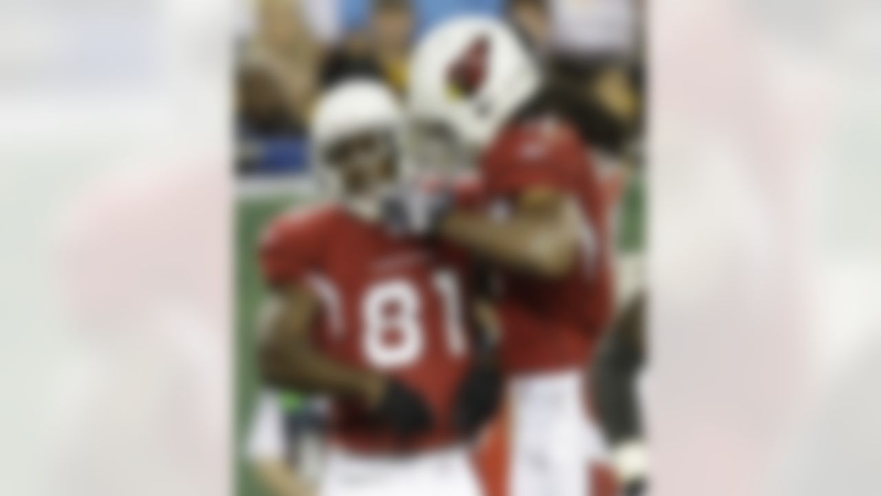 Arizona Cardinals wide receiver Anquan Boldin (81) celebrates his reception with Larry Fitzgerald (11), setting up a touchdown, during the second quarter of the NFL Super Bowl XLIII football game, Sunday, Feb. 1, 2009, in Tampa, Fla. (AP Photo/Julie Jacobson)