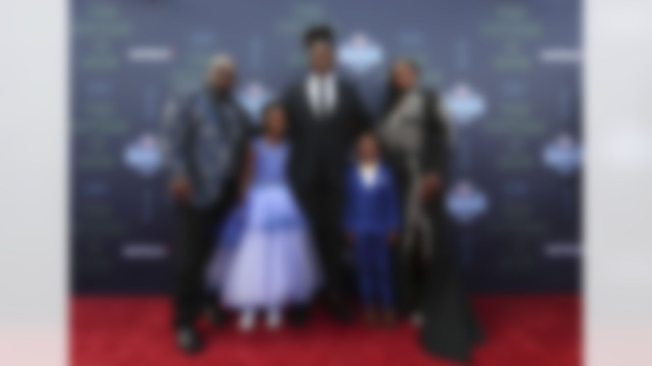 Shaquem Griffin poses with his family on the red carpet.