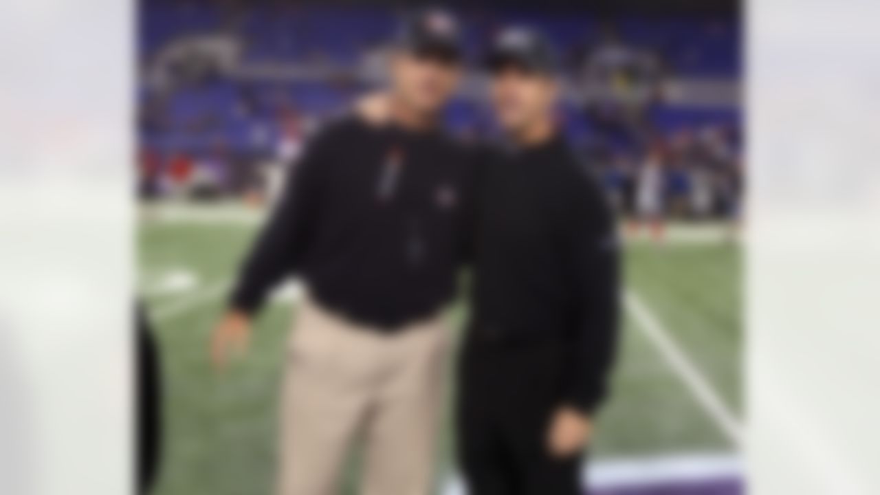 San Francisco 49ers head coach Jim Harbaugh and Baltimore Ravens head coach John Harbaugh prior to an NFL football game at M&T Bank Stadium in Baltimore, Thursday, Nov. 24, 2011. The Harbaughs became the first brothers to face each other as NFL head coaches. (Ben Liebenberg/NFL)
