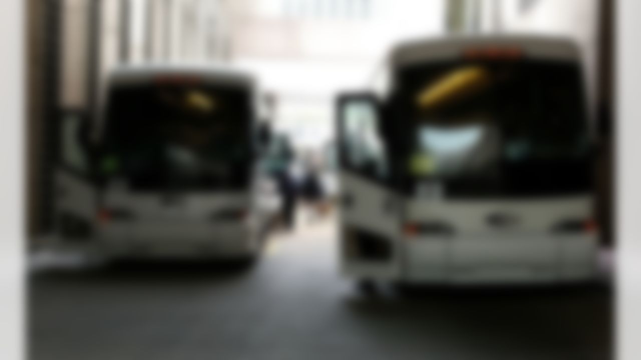 Buses to take the Baltimore Ravens to practice are check by security dogs at their hotel in New Orleans, LA., on Jan. 30, 2013. (Ben Liebenberg/NFL)
