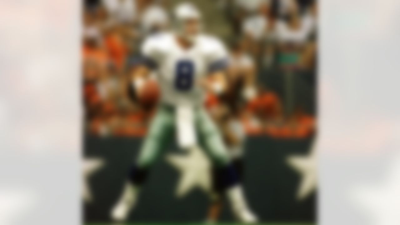 American Hall of Fame quarterback Troy Aikman #8 of the Dallas Cowboys. The overall draft pick in 1989, Aikman played 12 consecutive seasons as quarterback with the Cowboys. (AP Photo/Marc Serota)