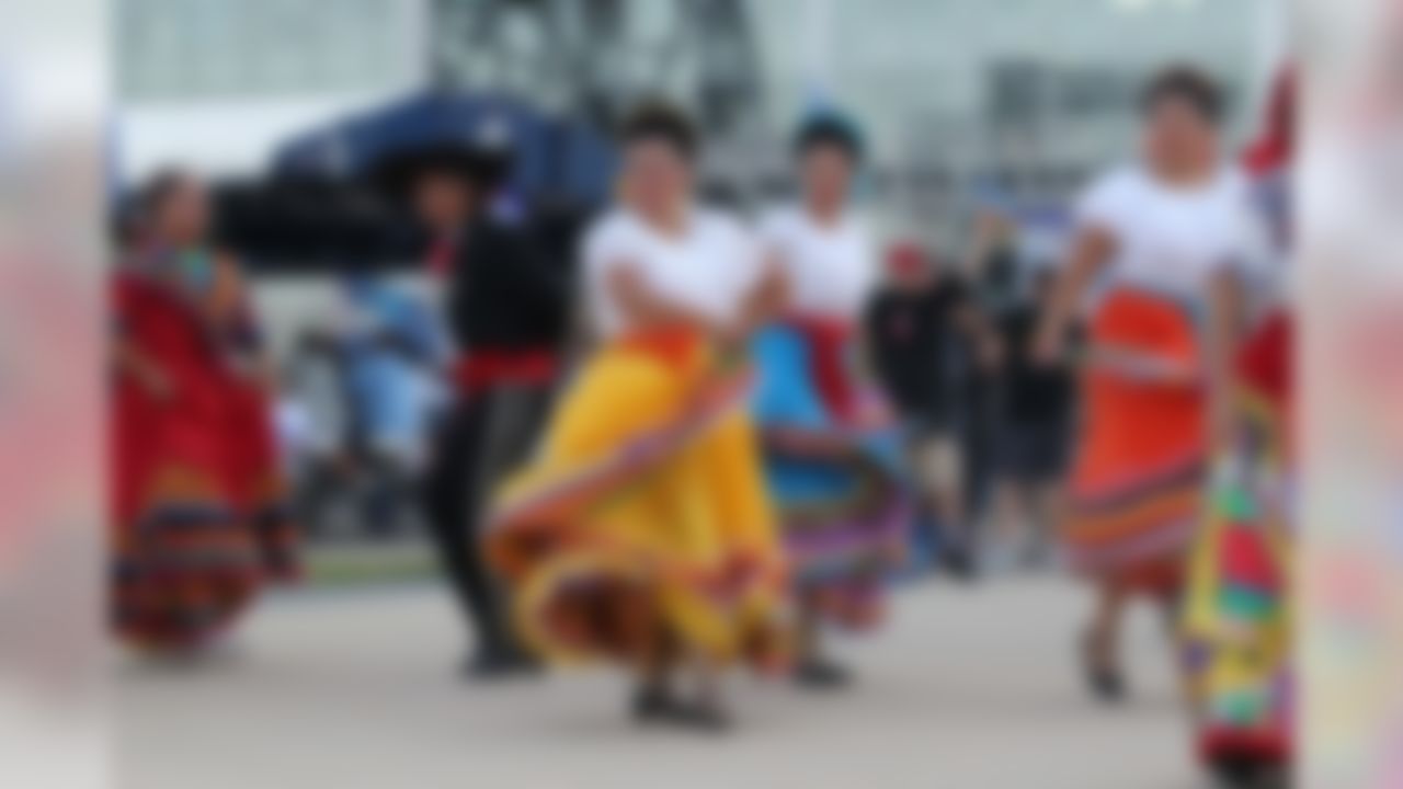 Sep 26, 2011; Arlington, TX, USA; Mariachi and Ballet Folkorico dancers perform outside before the game between the Dallas Cowboys and the Washington Redskins at Cowboys Stadium. Mandatory Credit: Tim Heitman-US PRESSWIRE