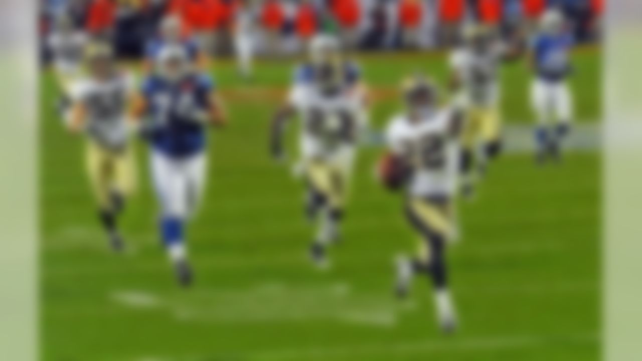 New Orleans Saints cornerback Tracy Porter (22) runs back an intercepted pass for a touchdown in the fourth quarter of the NFL Super Bowl XLIV football game against the Indianapolis Colts in Miami, Sunday, Feb. 7, 2010. (AP Photo/Dick Druckman)